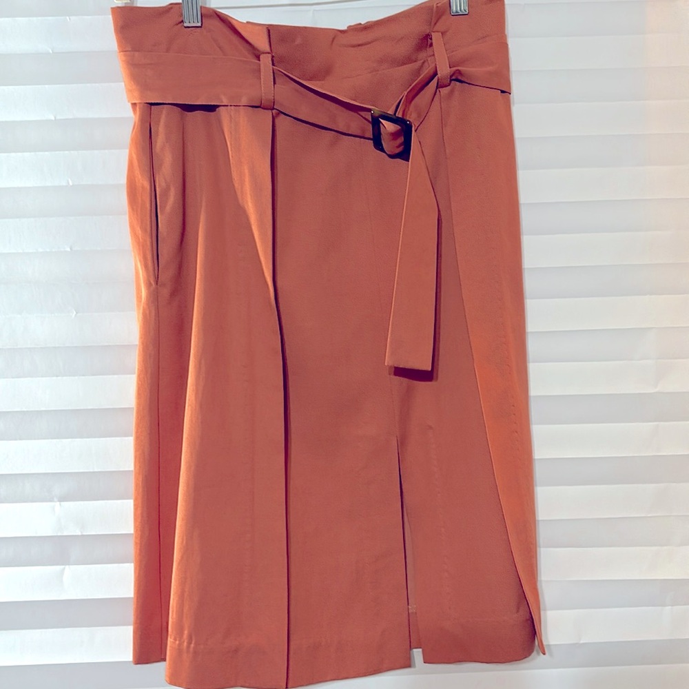 Knee length linen blend coral skirt with a pocket